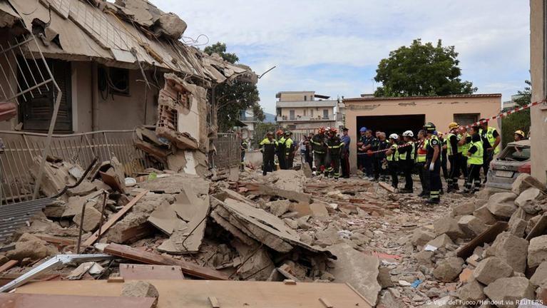 Building collapse in Naples kills mother and two children after suspected gas explosion