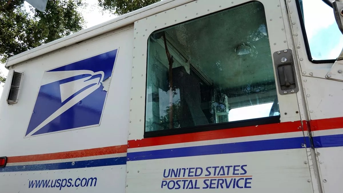 Michigan man charged with assaulting mail carrier over political mailer